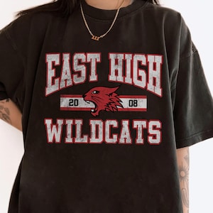 Maglietta con logo della mascotte della East High School, Disney High School Musical The Series, maglietta regalo per una vacanza in famiglia a Disneyland, maglietta regalo per il compleanno a Walt Disney World
