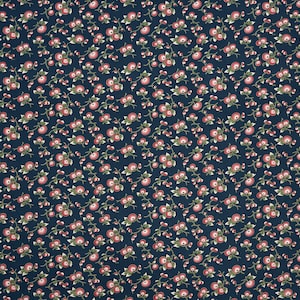 May include: Dark navy fabric with a repeating pattern of small red and white flowers and green leaves. The floral design is spread across the entire surface, creating a dense, textured appearance. The fabric is likely cotton or a similar material.