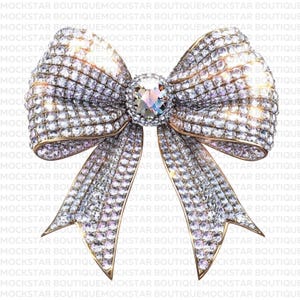 May include: A large, white bow made of sparkling rhinestones with a gold center. The bow is tied with a gold ribbon.