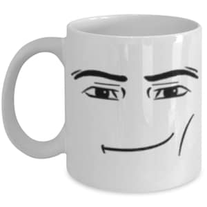May include: White ceramic coffee mug with a black and white illustration of a face with a smirk. The face has eyebrows, eyes, and a slight smile.