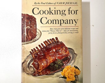 May include: A vintage cookbook titled "Cooking for Company" by the Food Editors of Farm Journal. The cover features a chocolate cake and a roasted rack of lamb.