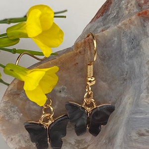 Earrings with butterfly pendants