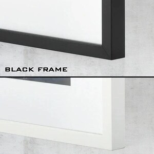 May include: A split-view display showing two rectangular picture frames. The top section features a black frame with the text BLACK FRAME below it. The bottom section features a white frame with the text WHITE FRAME below it. Both frames include a white mat.