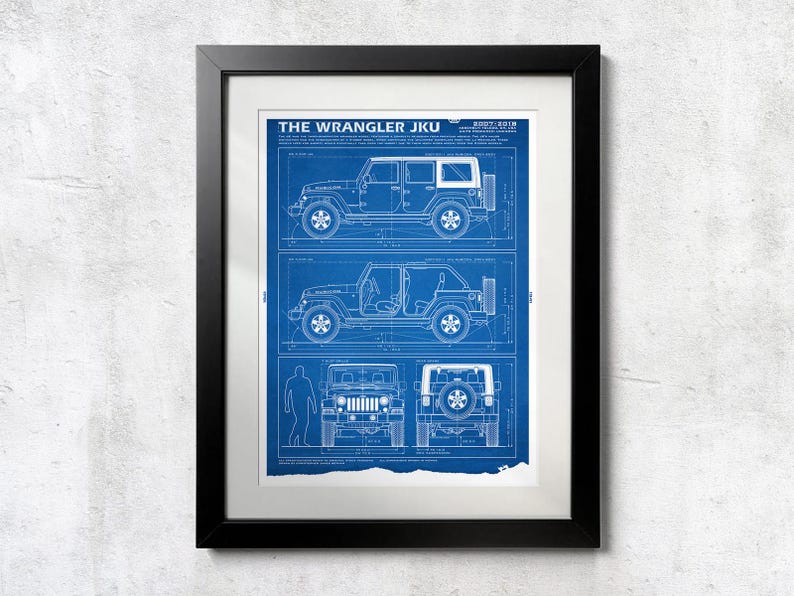 May include: A framed blueprint art print titled THE WRANGLER JKU 2007-2018. The blue and white technical drawing displays side, front, and rear views of a four-door Jeep Wrangler, including detailed line work, measurements, and technical specifications.