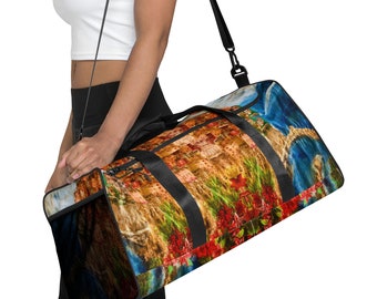 May include: A colourful travel duffel bag with a cityscape and floral design. The bag has black straps and a zipper closure.