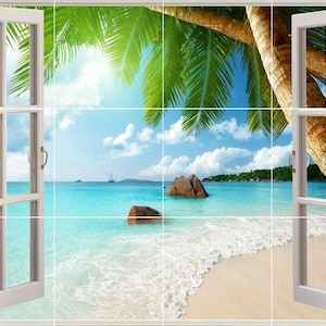 May include: A white window frame with a view of a tropical beach. The beach is white sand with blue water and a palm tree in the foreground.