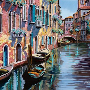 May include: A painting of a canal in Venice, Italy. The canal is lined with colorful buildings and there are several gondolas docked along the sides. The water is a deep blue and reflects the buildings and sky.