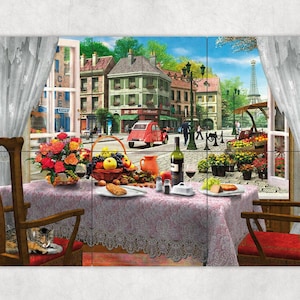 May include: A table setting with a white tablecloth and lace overlay, featuring a glass of red wine, a loaf of bread, a bowl of fruit, and a vase of flowers. The table is set for two, with two chairs and a cat sitting on one of them. The window behind the table looks out onto a Parisian street scene with a red car, people walking, and the Eiffel Tower in the distance.