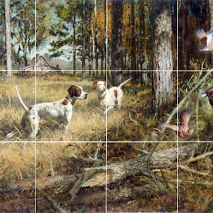 May include: Two white and brown hunting dogs in a forest setting with brown and green foliage. The dogs are pointing their noses towards the ground, suggesting they are hunting. There are three brown and white birds flying in the background.