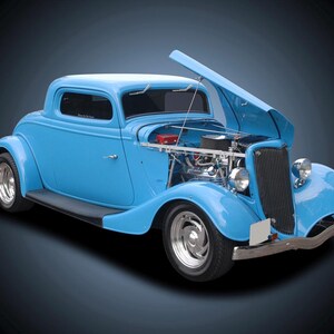 May include: A light blue 1934 Ford Coupe with the hood open, revealing the engine. The car has chrome accents and black tires.