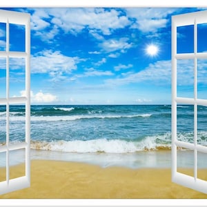 May include: A white window frame with two open windows looking out at a blue ocean with white waves crashing on a sandy beach. The sky is blue with white clouds and a bright sun shining.
