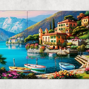 May include: A painting of a picturesque Italian village nestled on a hillside overlooking a calm blue lake. Lush green trees and colorful flowers surround the buildings, while boats are docked in the water. The scene is bathed in warm sunlight, creating a serene and idyllic atmosphere.