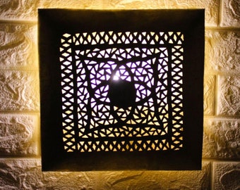 Square chiseled copper wall light