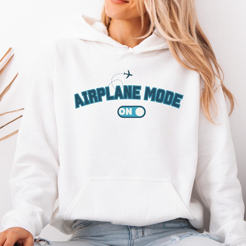May include: White hoodie with a blue graphic that says "Airplane Mode On" with a plane icon and a toggle switch.