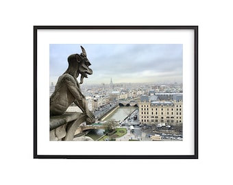 May include: A stone gargoyle sits atop a building overlooking the city of Paris, France. The gargoyle is looking out over the cityscape, which includes the Seine River and several bridges. The sky is cloudy and the city is in the distance.