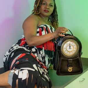 Clock shaped backpack / shoulder bag / cross body bag