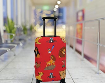 May include: Red suitcase featuring a pattern of characters from The Lion King, including Simba, Mufasa, and Zazu.