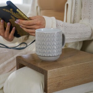 White oak couch arm tray table handcrafted for functionality and style serves as a sofa armrest table or wood side table designed for small spaces it provides a stable surface for drinks or snacks fits securely on most sofa arms and enhances the look of any modern or rustic interior