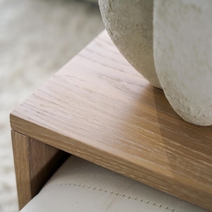 Functional and stylish over ottoman table top designed as a coffee table tray use this wood overlay as a cocktail tray or ottoman tray table for drinks food and remotes perfect fit for most ottomans it adds stability and versatility to your living room setup without sacrificing aesthetics