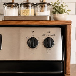 Wooden spice rack for above stove storage featuring a warm walnut finish custom sizing and sturdy hardwood construction made to organize seasonings cooking oils and pantry jars while reducing clutter on the kitchen countertop
