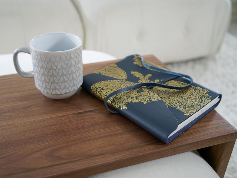 Functional and stylish over ottoman table top designed as a coffee table tray use this wood overlay as a cocktail tray or ottoman tray table for drinks food and remotes perfect fit for most ottomans it adds stability and versatility to your living room setup without sacrificing aesthetics