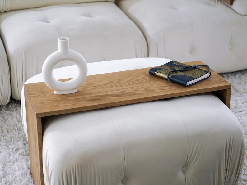 Wooden over ottoman tray table designed to convert your ottoman into a functional coffee table this overlay ottoman table top provides a stable surface for snacks drinks or decor a stylish ottoman cover that doubles as a cocktail tray or sofa tray perfect for small spaces and modern living rooms