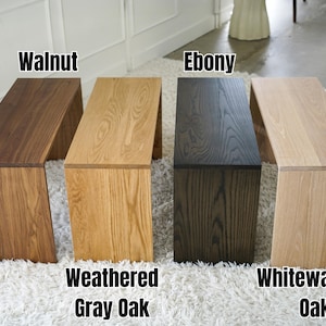 Transform your ottoman into a practical coffee table with this over ottoman tray table crafted as an ottoman table top overlay it serves as a stylish cocktail tray or sofa arm tray ideal for holding drinks snacks books or decor and a great addition to any modern or rustic home