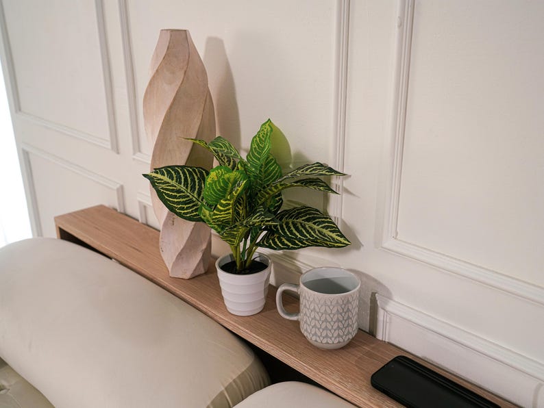 Handmade wood entryway console table with modern organic design and vintage inspired style perfect for hallway living room foyer and behind sofa placement crafted as a minimalist accent furniture piece for contemporary homes apartments and rustic interiors ideal for displaying home decor plants candles books and decorative accessories while creating a warm inviting and stylish atmosphere in any space
