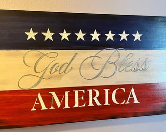 God Bless America carved hanger