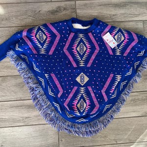 メキシコの刺繍ポンチョ。イスラ フェア ポンチョ。メキシコの