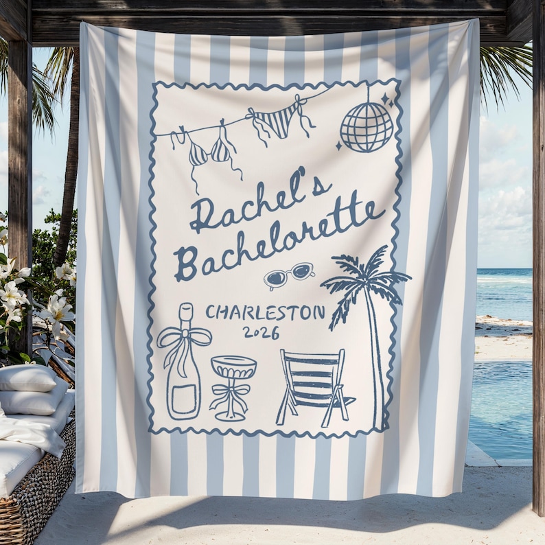 May include: A white and blue striped beach towel with a blue illustration. The illustration includes the text "Rachel's Bachelorette Charleston 2026", a bikini, sunglasses, a disco ball, a palm tree, a champagne bottle, a cocktail glass, and a beach chair.