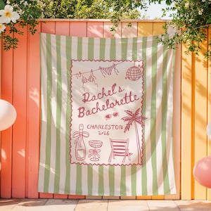 May include: A green and white striped fabric banner with a pink framed illustration that reads "Rachel's Bachelorette Charleston 2026". The illustration includes a bikini, disco ball, sunglasses, palm tree, champagne bottle, and beach chair.