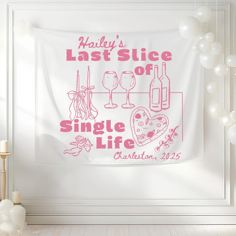 May include: A white fabric wall hanging with pink text and illustrations. The text reads "Hailey's Last Slice of Single Life" with images of candles, wine glasses, bottles, and a heart-shaped pizza. The location and year "Charleston, 2025" are also included.