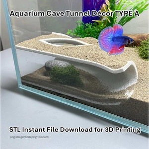 May include: A white 3D printed aquarium cave tunnel decor, labelled "Aquarium Cave Tunnel Décor TYPE A". The tunnel is designed to provide a hiding place for fish. The image shows the tunnel in a fish tank with sand and a small plant.