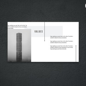 May include: A monochrome presentation slide featuring the word "VALUES" and a skyscraper image. The slide has placeholder text and a dark grey background. The Canva logo is in the top right corner.