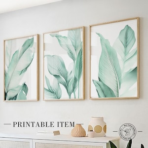 Printable sage green tropical leaves art set of 3 prints. Botanical greenery gallery wall art prints. Modern nature wall art set