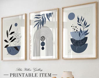 Juego de 3 láminas de arte mural moderno de mediados de siglo en azul marino. Pósteres botánicos bohemios. Conjunto de galería de pared con plantas abstractas bohemias sobre la cama.