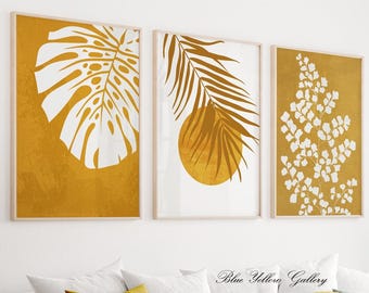 Mustard yellow botanical wall art set of 3 prints. Modern tropical leaves gallery wall set. Bright aesthetic room decor