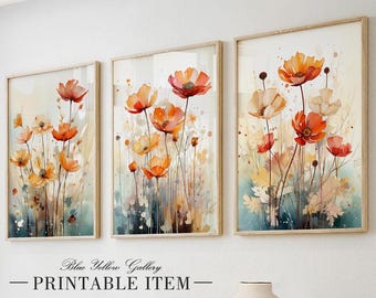 May include: Three framed watercolor paintings of orange and yellow flowers with green stems and leaves. The paintings are in wooden frames with a white background.