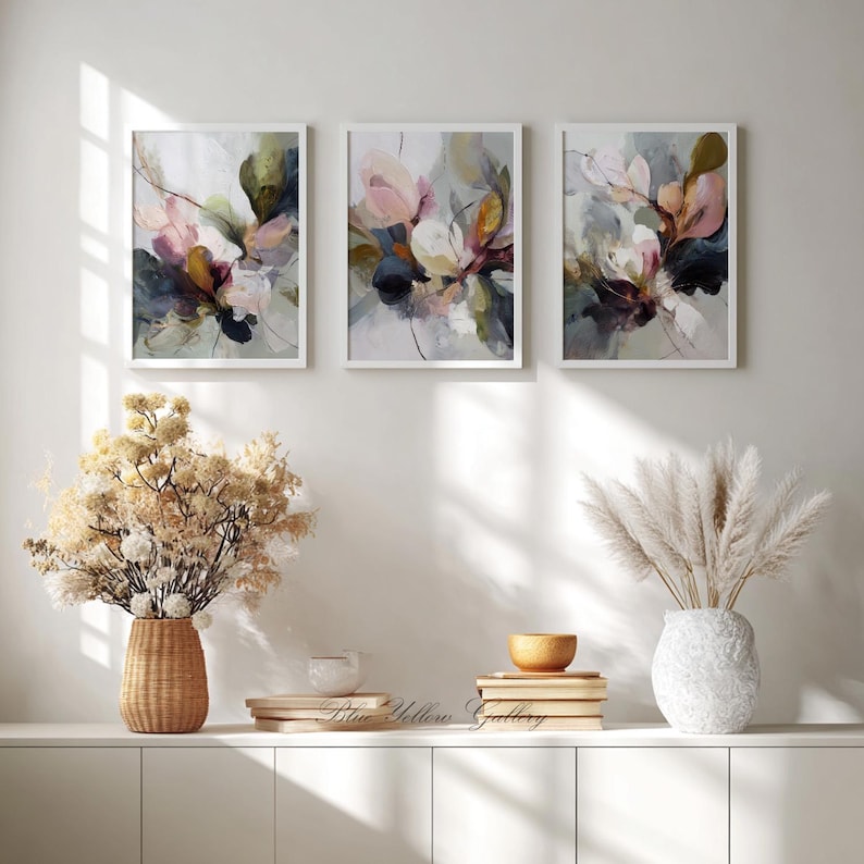 Neutral floral wall art set framed in light wood frames