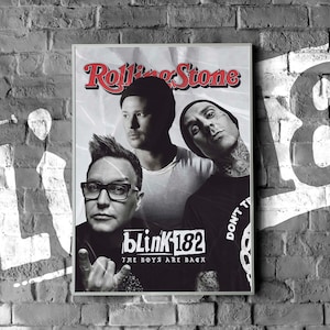 May include: Black and white photograph of the rock band Blink-182 on the cover of Rolling Stone magazine. The magazine cover features the band members with the text "Blink-182" and "The Boys Are Back" in white. The text "Don't Try This At Home" is partially visible on the right side of the cover.