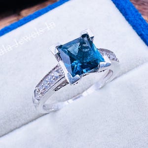 Art Deco London Blue Topaz Ring: Moissanite Sterling Silver Promise Ring