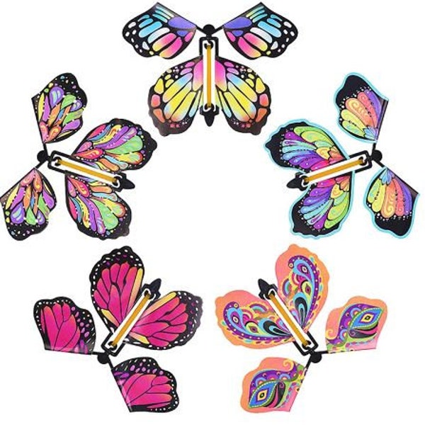 5 magic flying wind up butterfly.