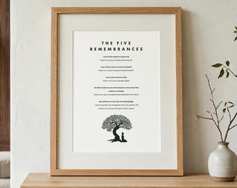 May include: A framed wall art print titled The Five Remembrances, featuring black text on a white background. The print includes a graphic of a tree and a person sitting beneath it. The frame is made of light-colored wood with a simple design.