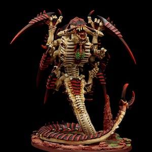 May include: A detailed, hand-painted miniature of a skeletal, red and white creature with a long, segmented tail. The creature has a gaping maw with sharp teeth and is posed in a menacing stance.