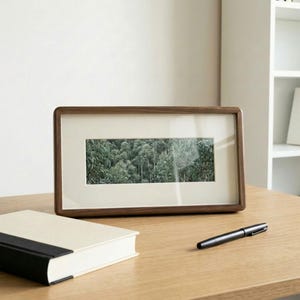 May include: A set of three ceramic nesting bowls in graduating sizes. The bowls are white with a speckled, textured finish and feature a slightly flared rim. The largest bowl measures approximately 20 cm in diameter.