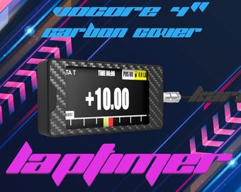May include: A black and grey lap timer with a carbon fibre cover displays a time of +10.00. The text "VOCore 4" carbon cover" and "lap timer" are in the image. The background has a blue and pink design.