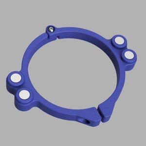 May include: A blue circular clamp with three white circular accents. The clamp has a hinge and a screw. The object is set against a grey background. The clamp is a mechanical part.