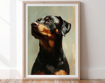 Może przedstawiać: Oprawiony wydruk artystyczny przedstawiający psa rasy Rottweiler. Pies jest przedstawiony w malarskim stylu, z czarną sierścią i brązowymi znaczeniami wokół pyska i oczu. Grafika jest oprawiona w jasną drewnianą ramę.