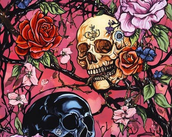 May include: Two skulls with intricate details are surrounded by a vibrant floral arrangement. The skulls are painted in black and white, while the flowers are a mix of pink, red, and purple. The background is a deep pink.